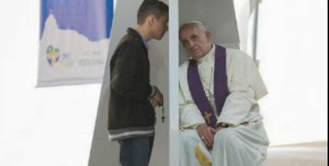 Pope Francis hears confession 